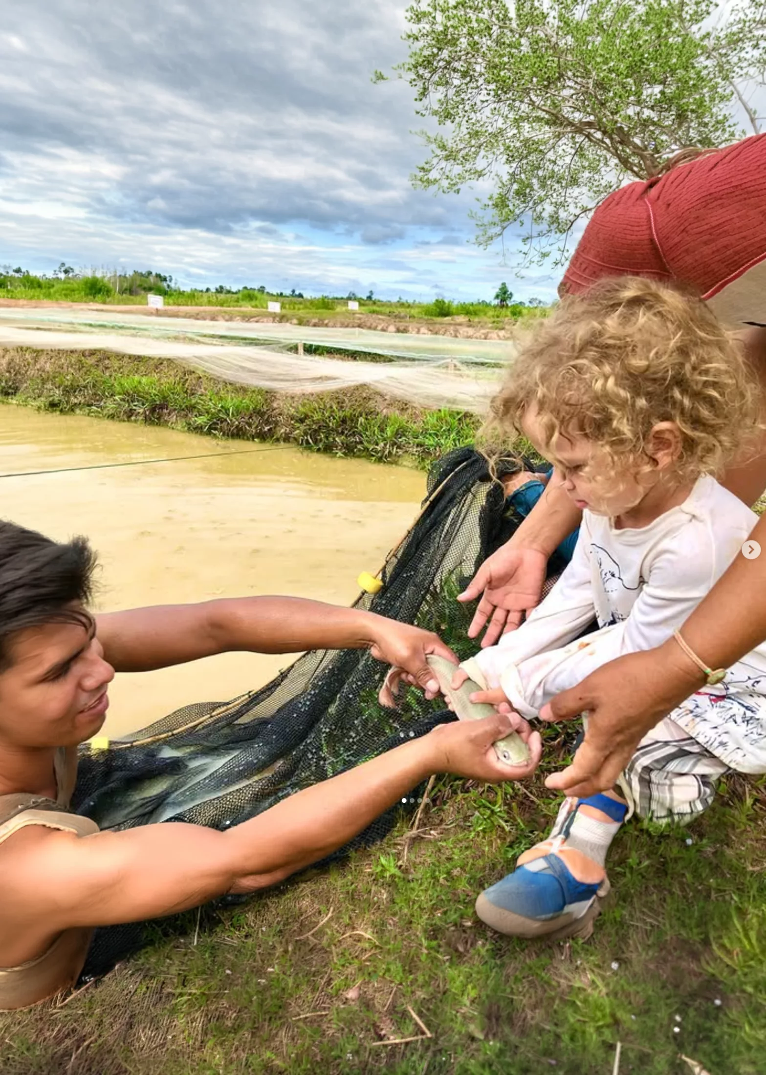 The aquaculture farm grows alongside the community that surrounds it